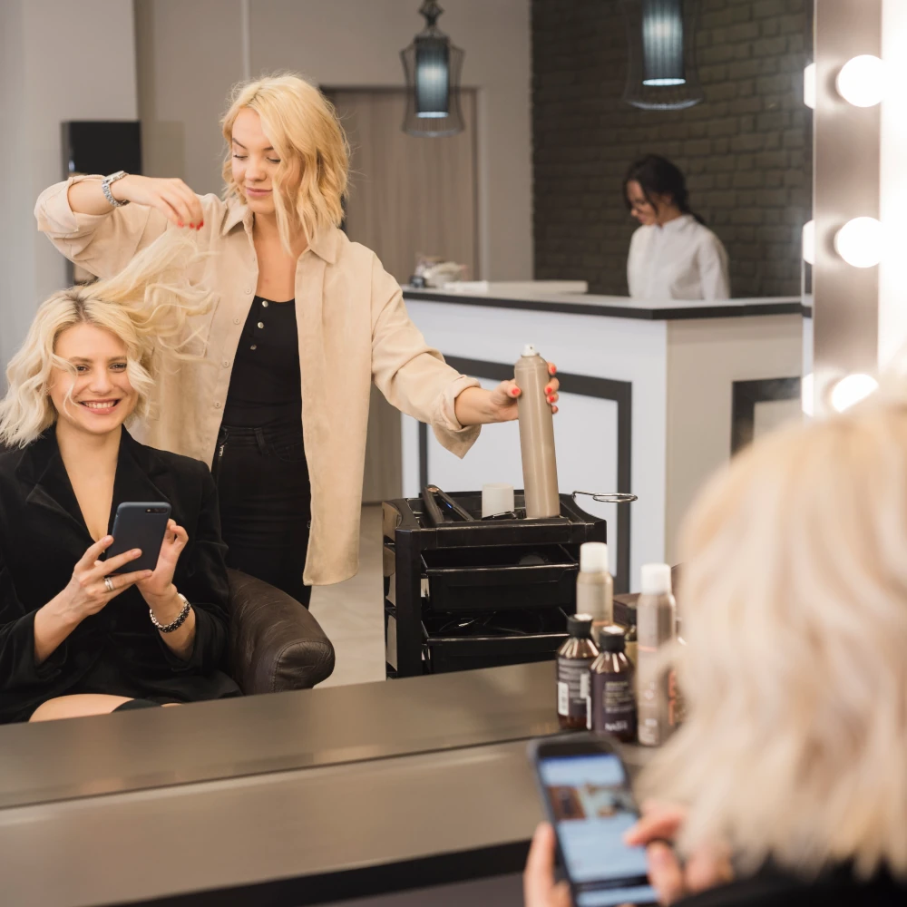 A hairdresser cutting a client's hair